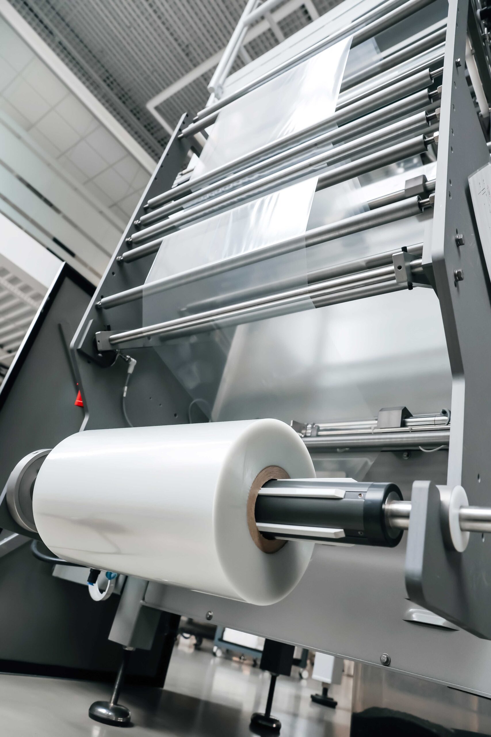 Vertical bagger reelholder film unwinding system processing packaging equipment packaging machine industrial factory packing food production line plastic waste